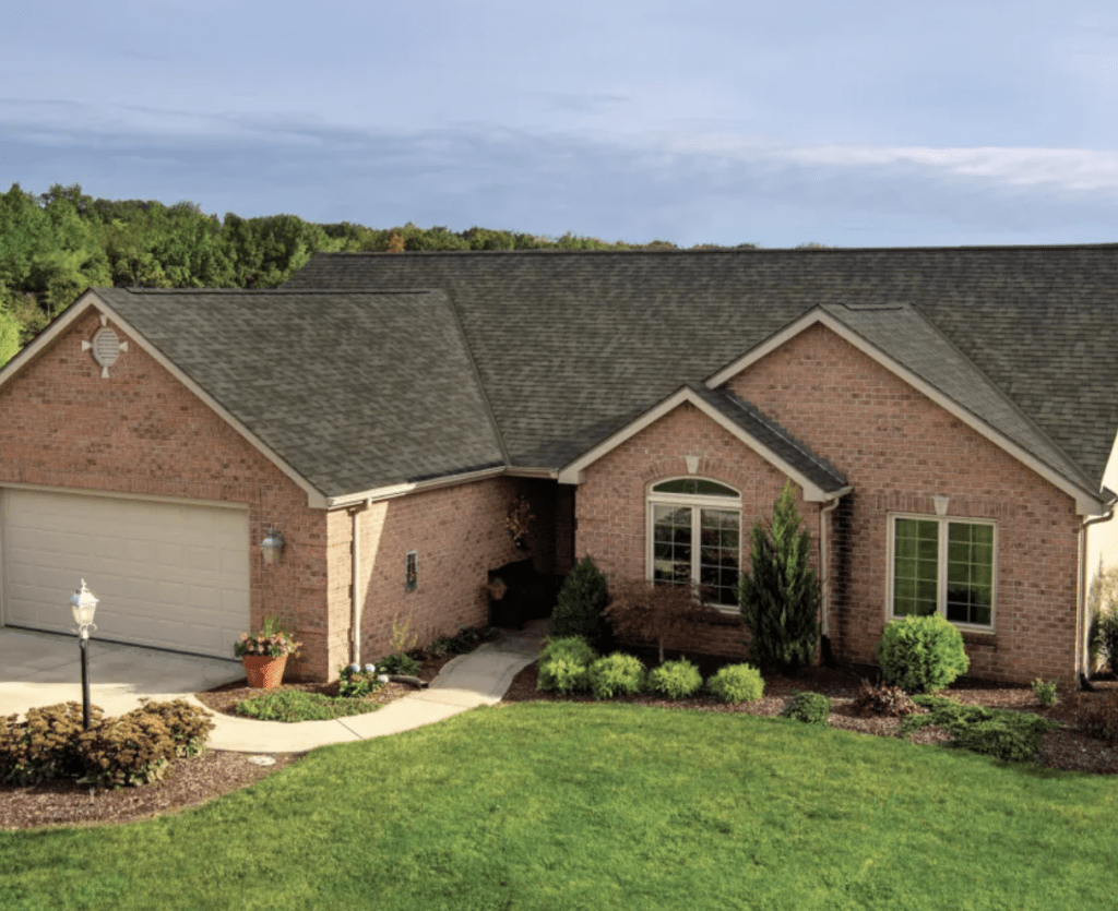 Cornerstone home exterior with siding and roofing in Centennial CO area