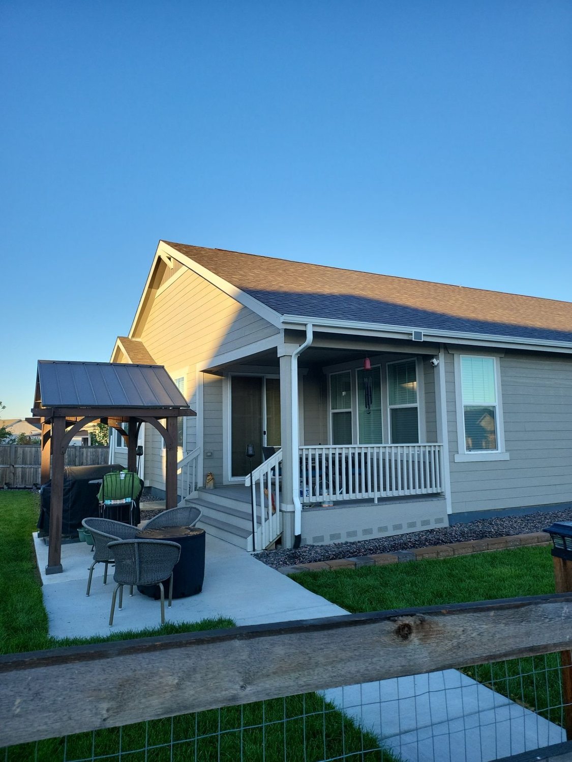 Home with an asphalt shingle roof in Johnstown, CO