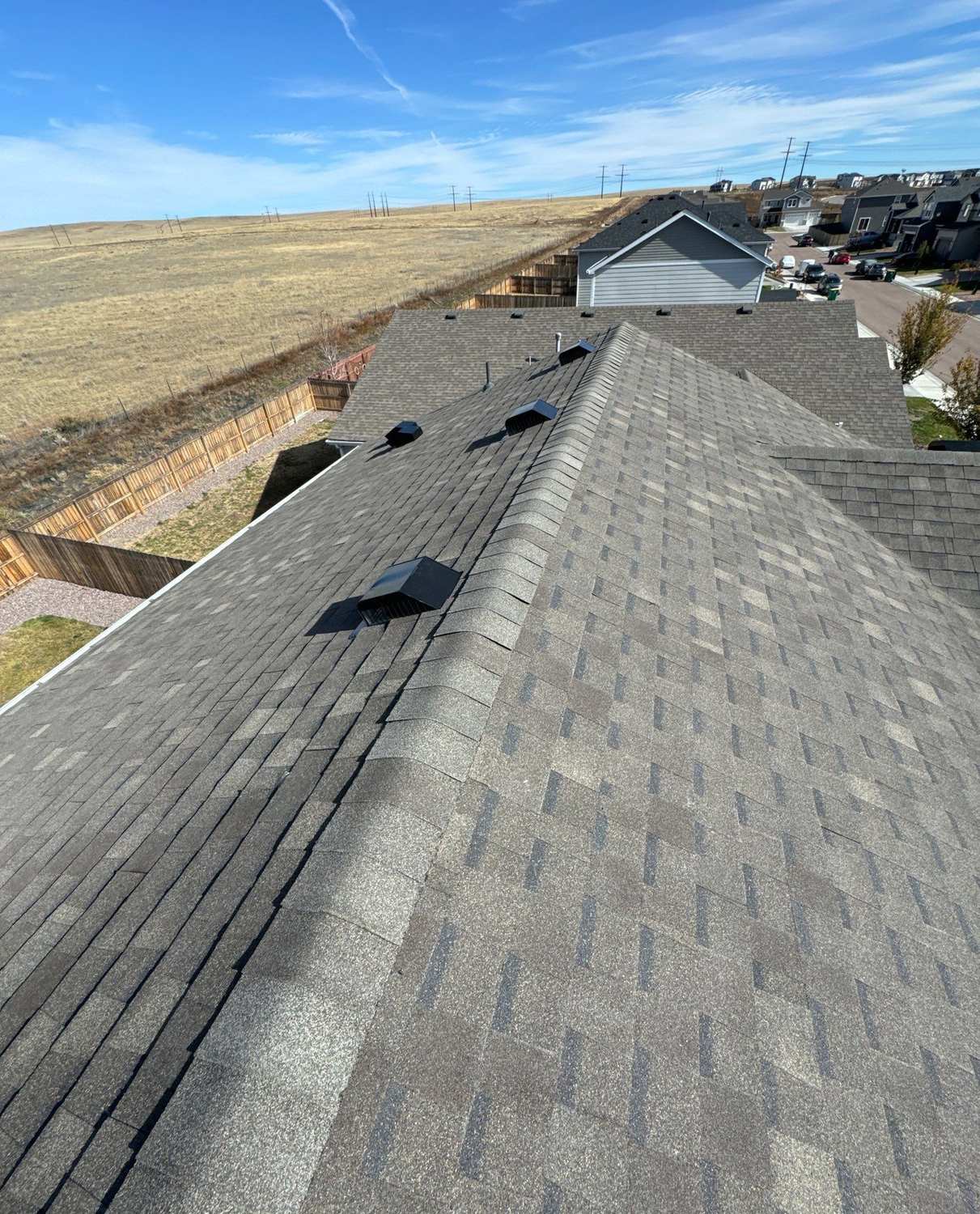 Ridge line on an Atlas Pinnacle Impact shingle roof in Colorado Springs, CO