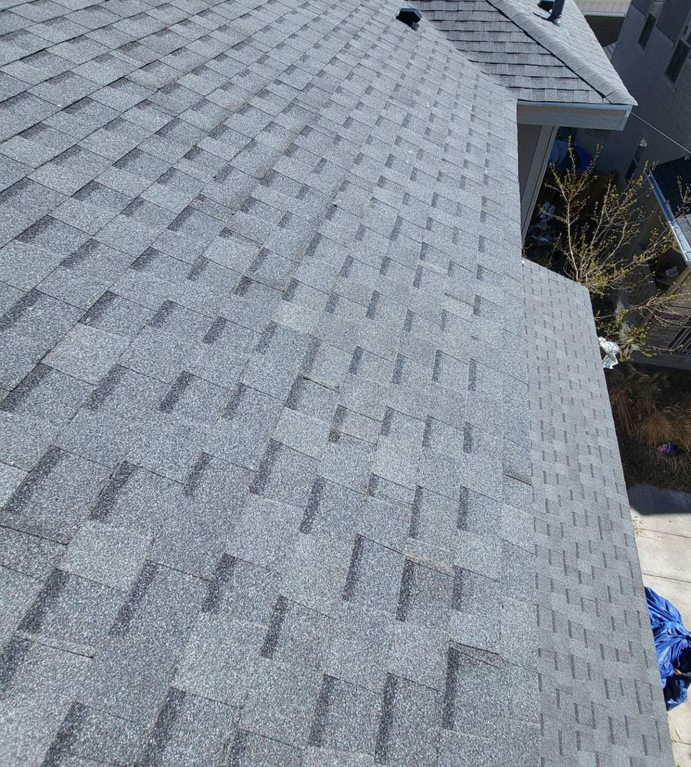 Atlas Pinnacle Impact shingle roof in Pewter with hips and valleys
