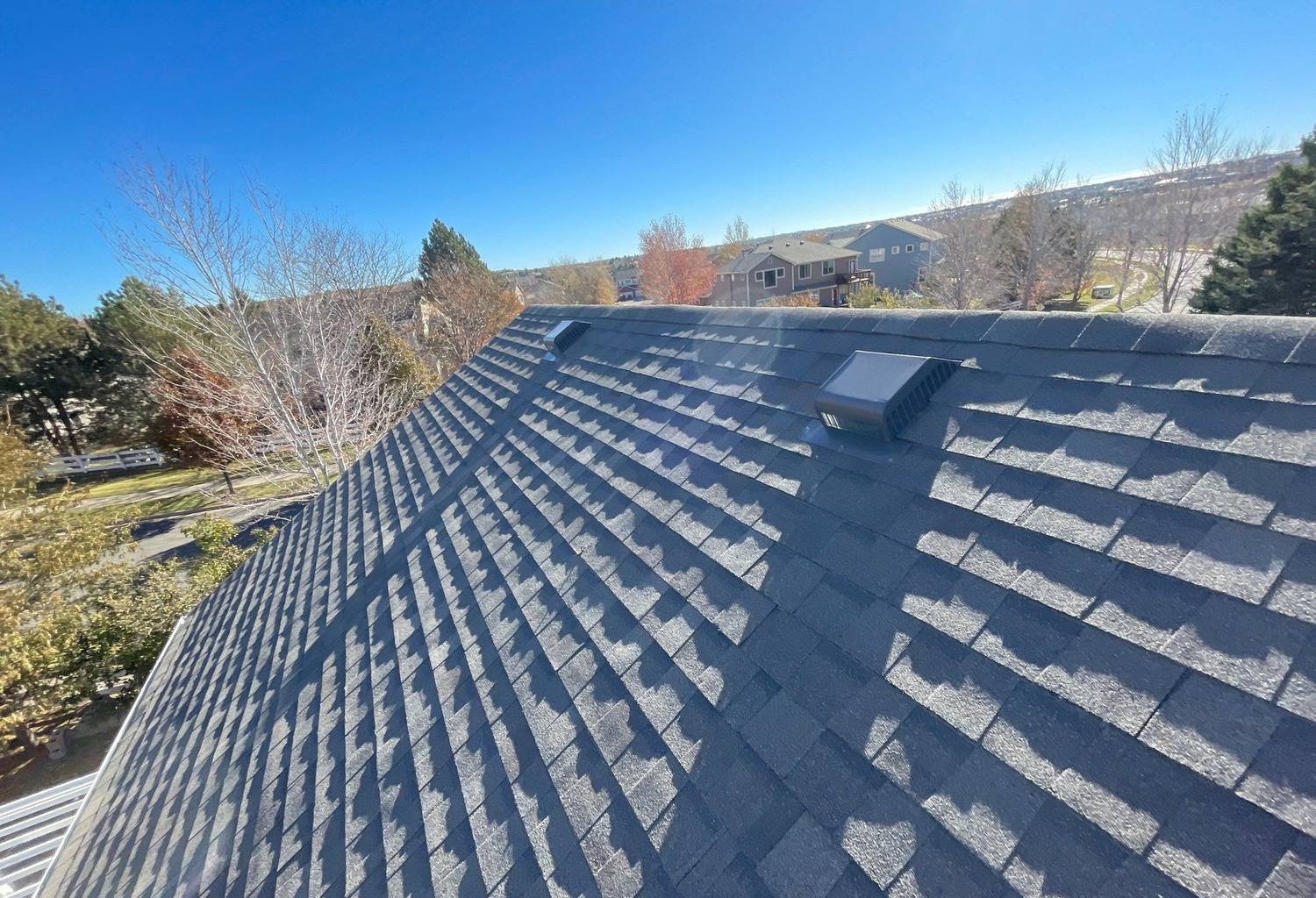 Atlas Pinnacle Impact shingle roof along a ridge in Centennial, CO