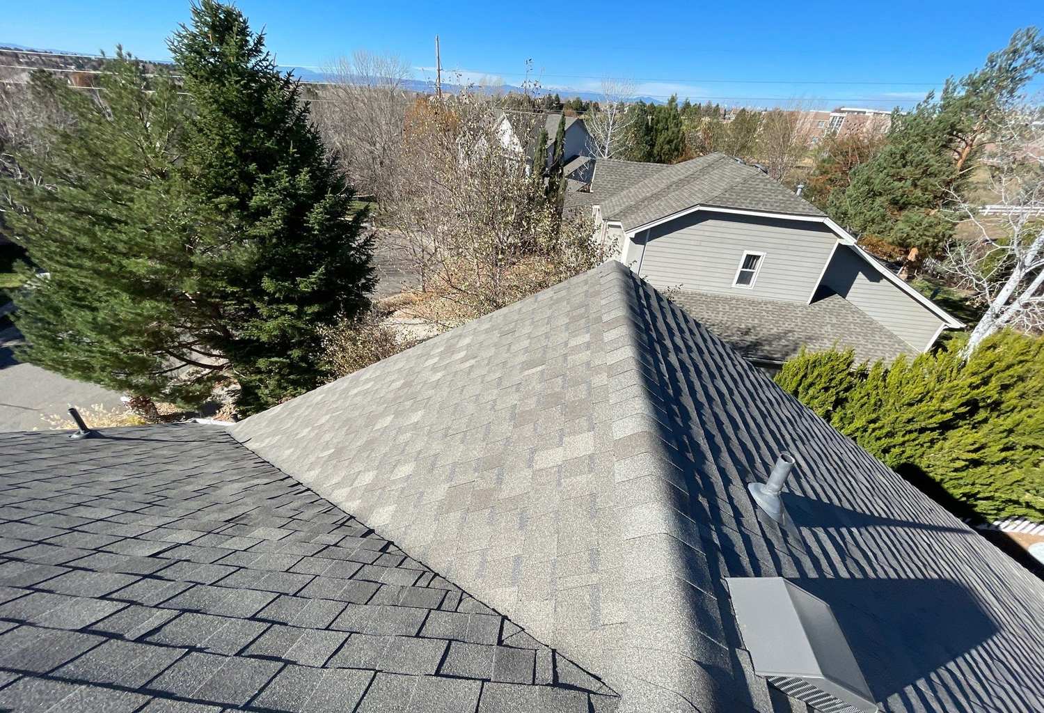 Atlas Pinnacle Impact shingle roof with valleys and vents in Centennial, CO