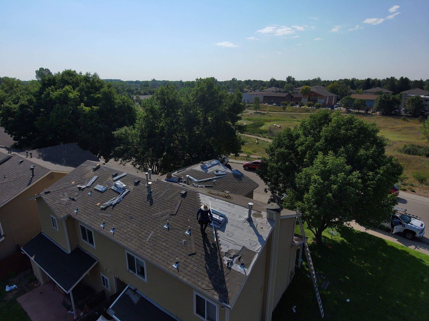 Aerial view of Atlas Pinnacle Impact roofs on townhomes in Fort Collins, CO
