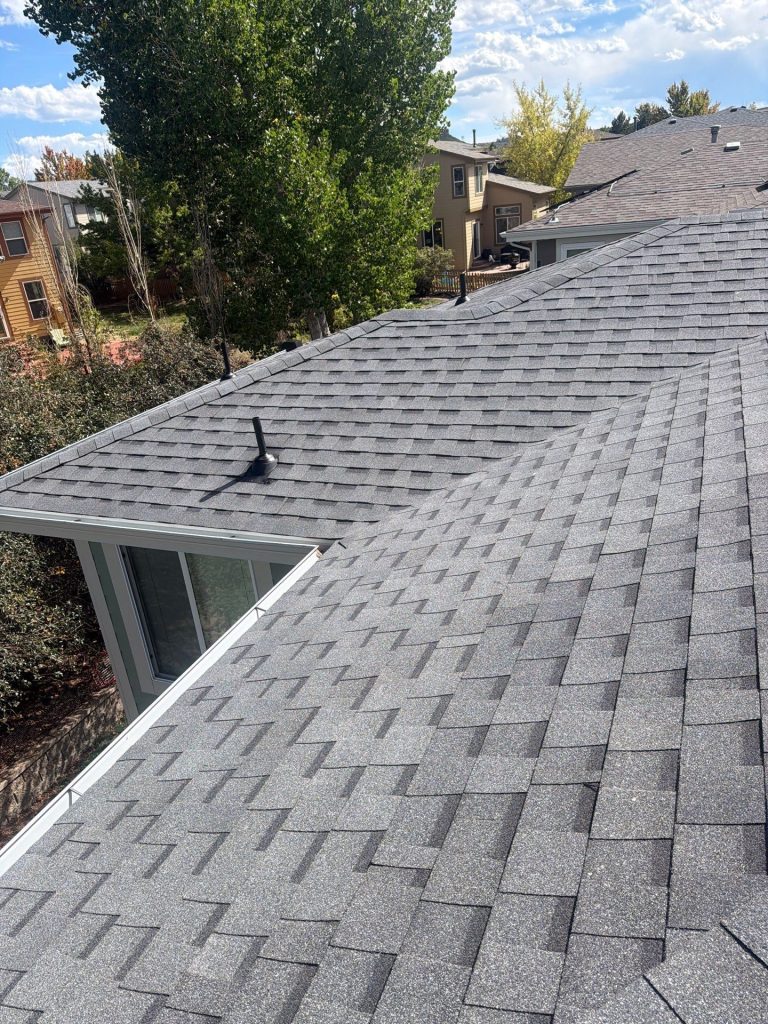 Finished architectural shingle roof on a Front Range home in Highlands Ranch, Colorado.