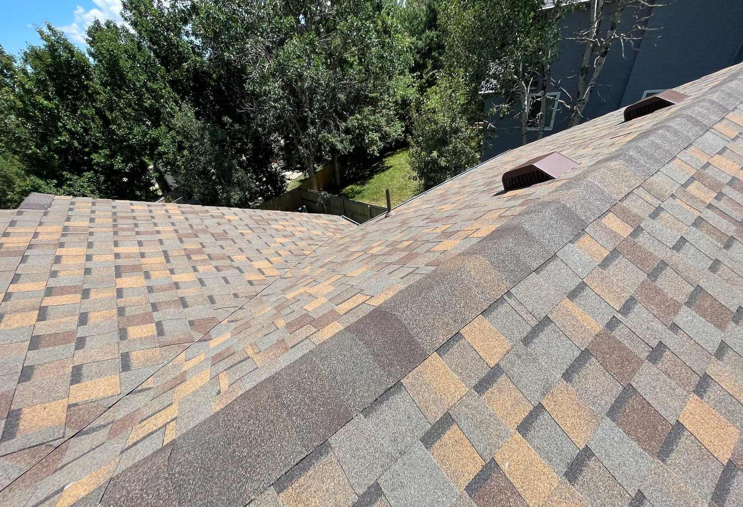 Ridge cap on an Atlas Pinnacle Pristine shingle roof in Centennial, CO
