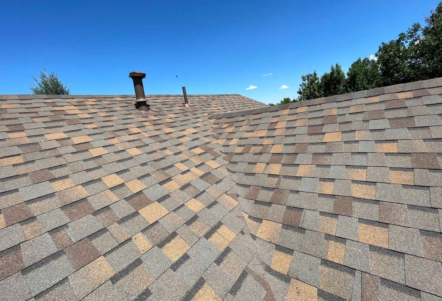 Atlas Pinnacle Pristine shingle roof in a brown blend in Centennial, CO