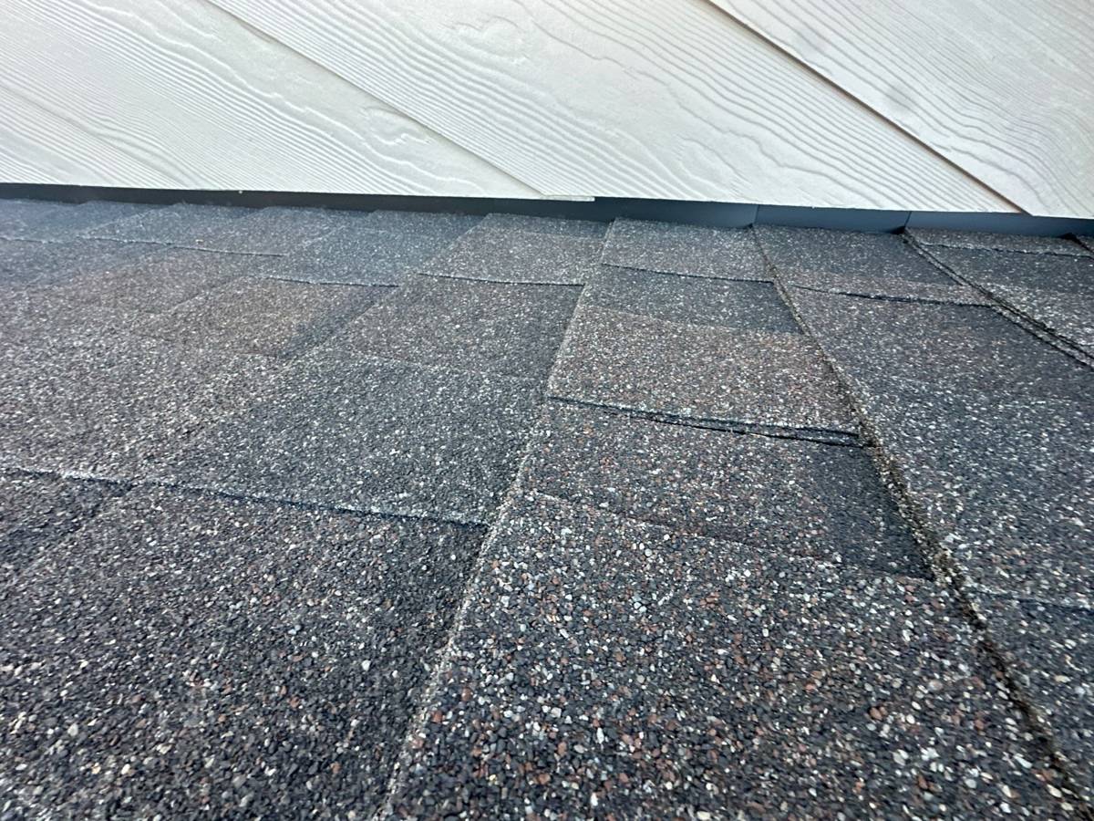 Close-up of Atlas StormMaster Shake shingles in Midnight Lake along a sidewall