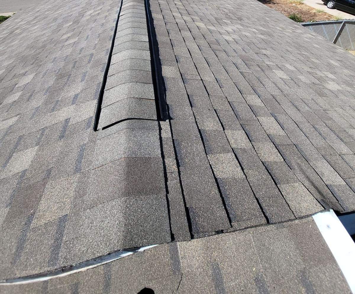 Atlas shingle roof with ridge vent in Aurora, CO