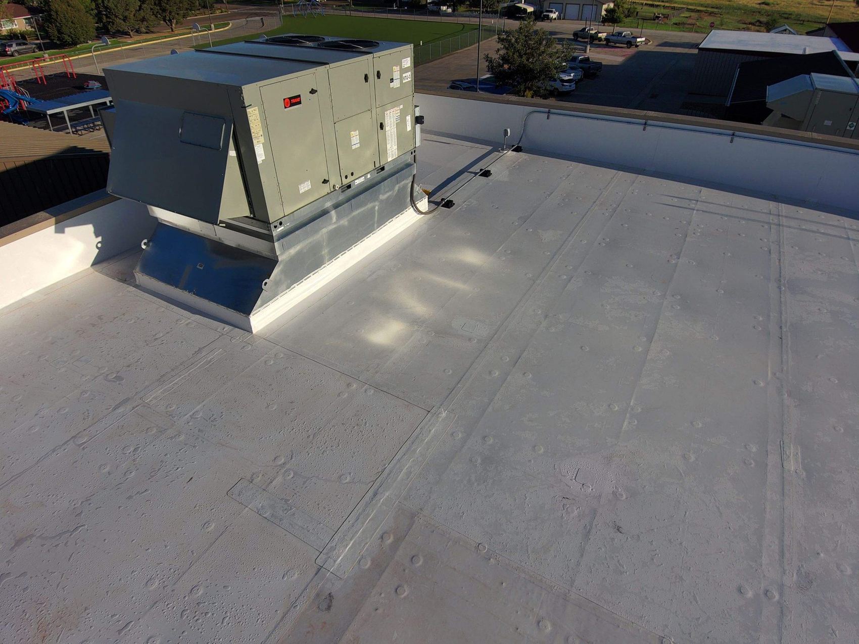 TPO roof membrane around HVAC curb on a commercial roof, Colorado