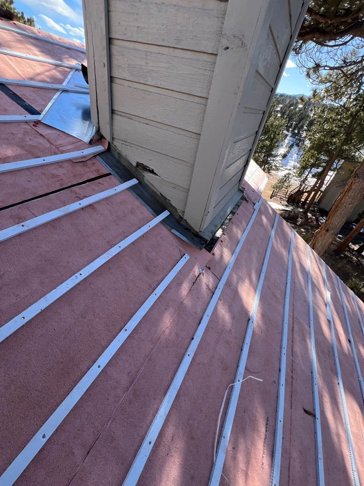 Underlayment and battens around a chimney for concrete tile in Evergreen, CO