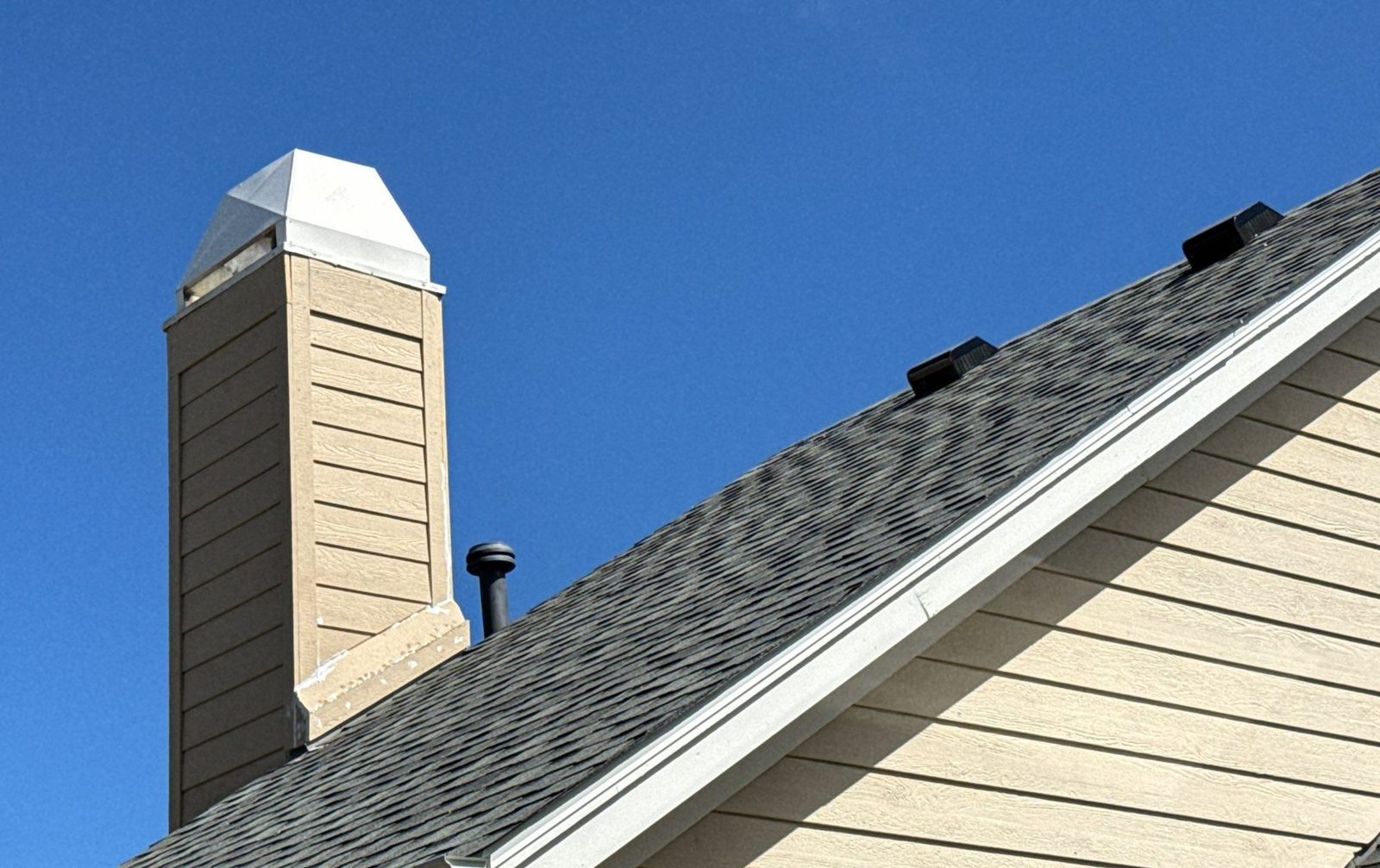 Atlas shingle roof edge and ridge vents in Denver, CO
