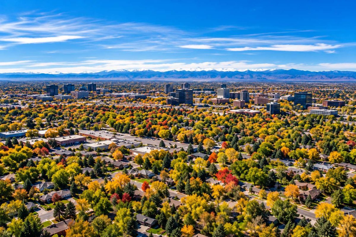 Aerial view of a Colorado Front Range neighborhood with the Rocky Mountains in the background