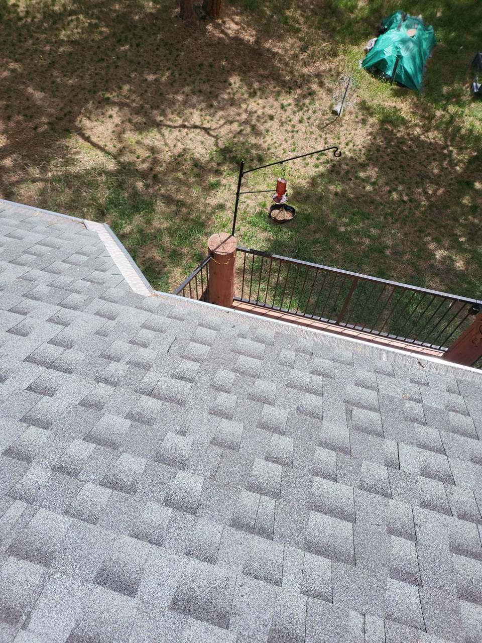 GAF Timberline AS II shingle roof in Slate above a deck on a wooded lot