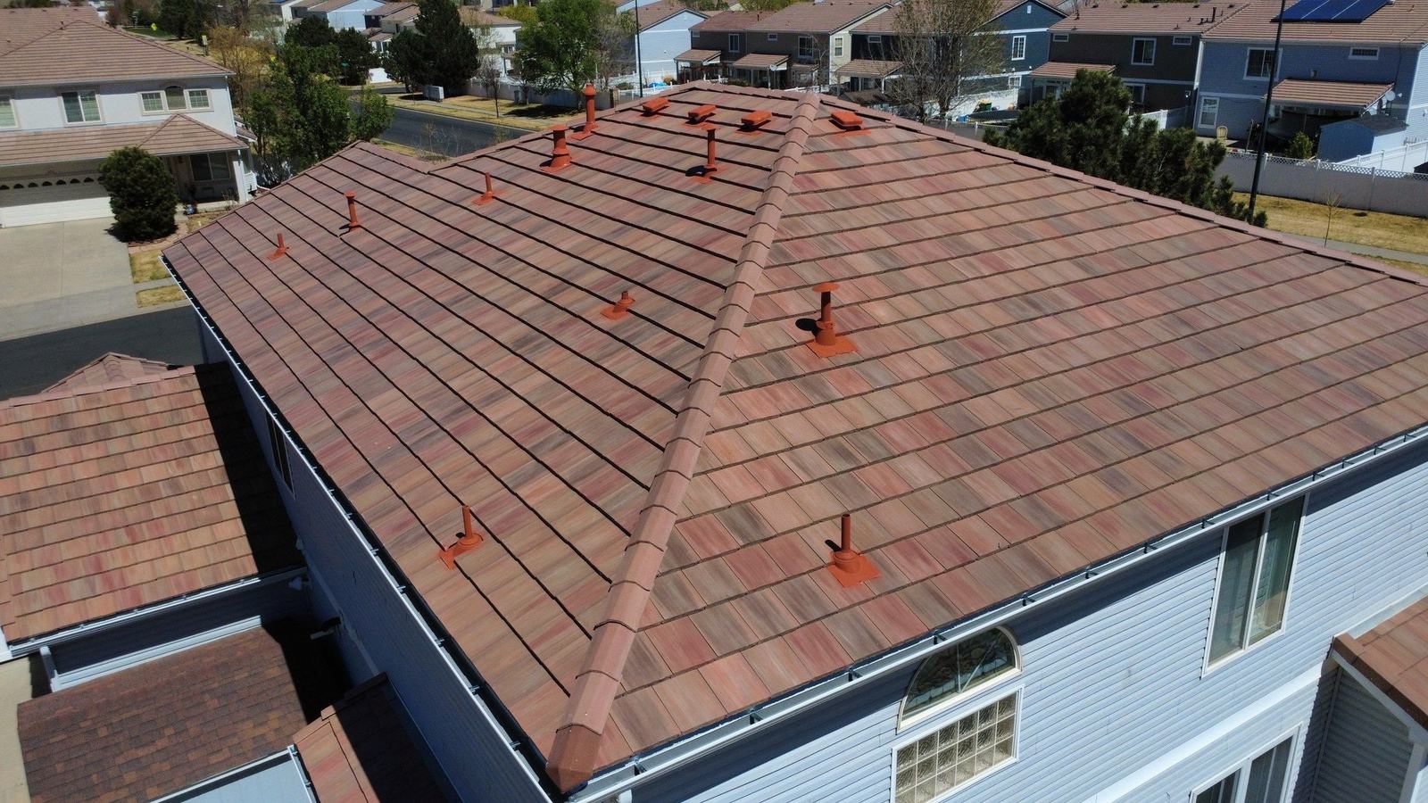 Saxony Slate concrete tile hip roof in Denver, CO