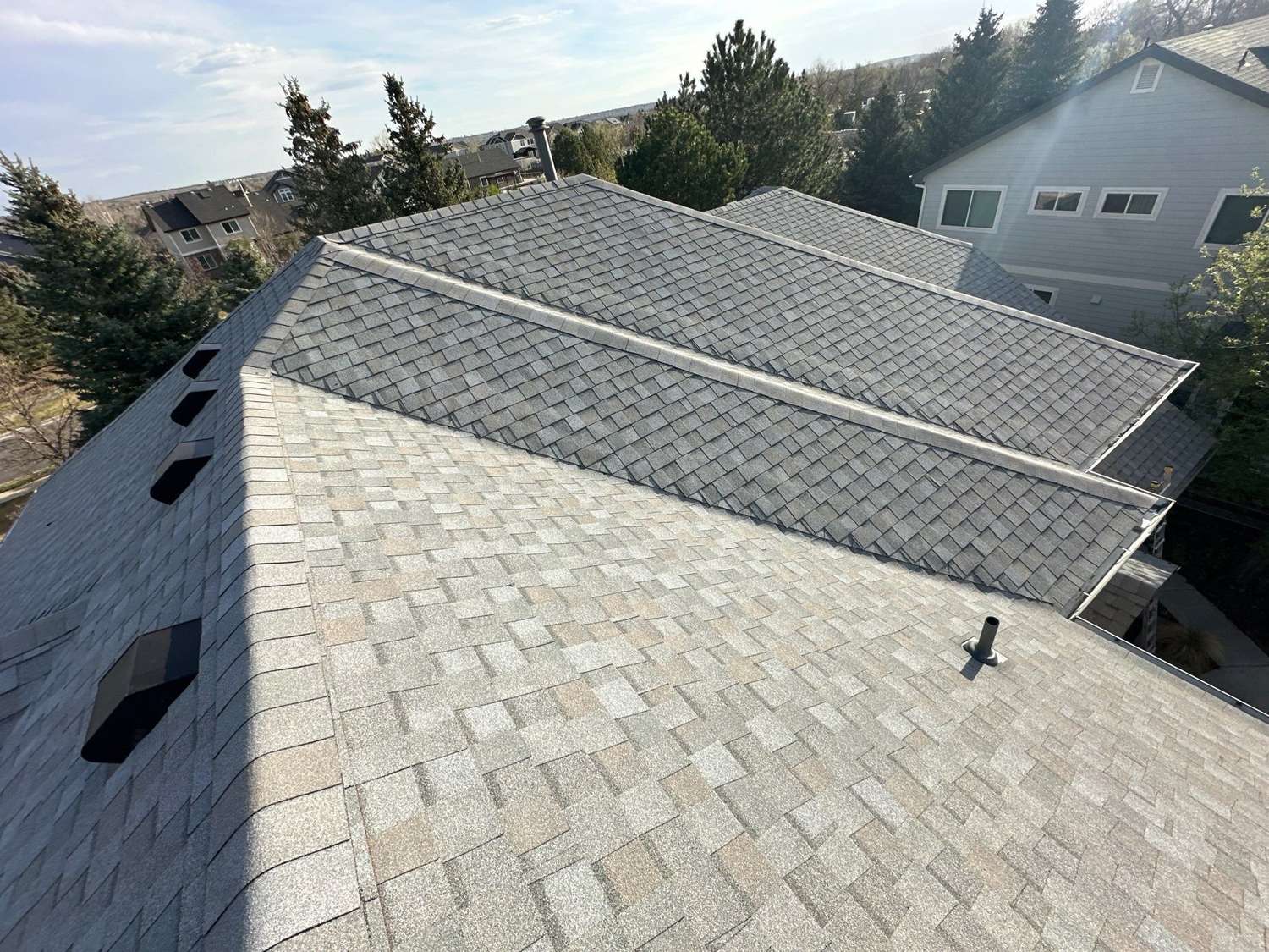 Multi-level TAMKO StormFighter Flex shingle roof in Arvada, CO